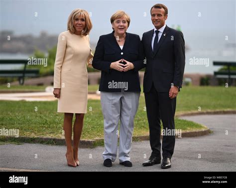 Brigitte Macron Greets German President in White 